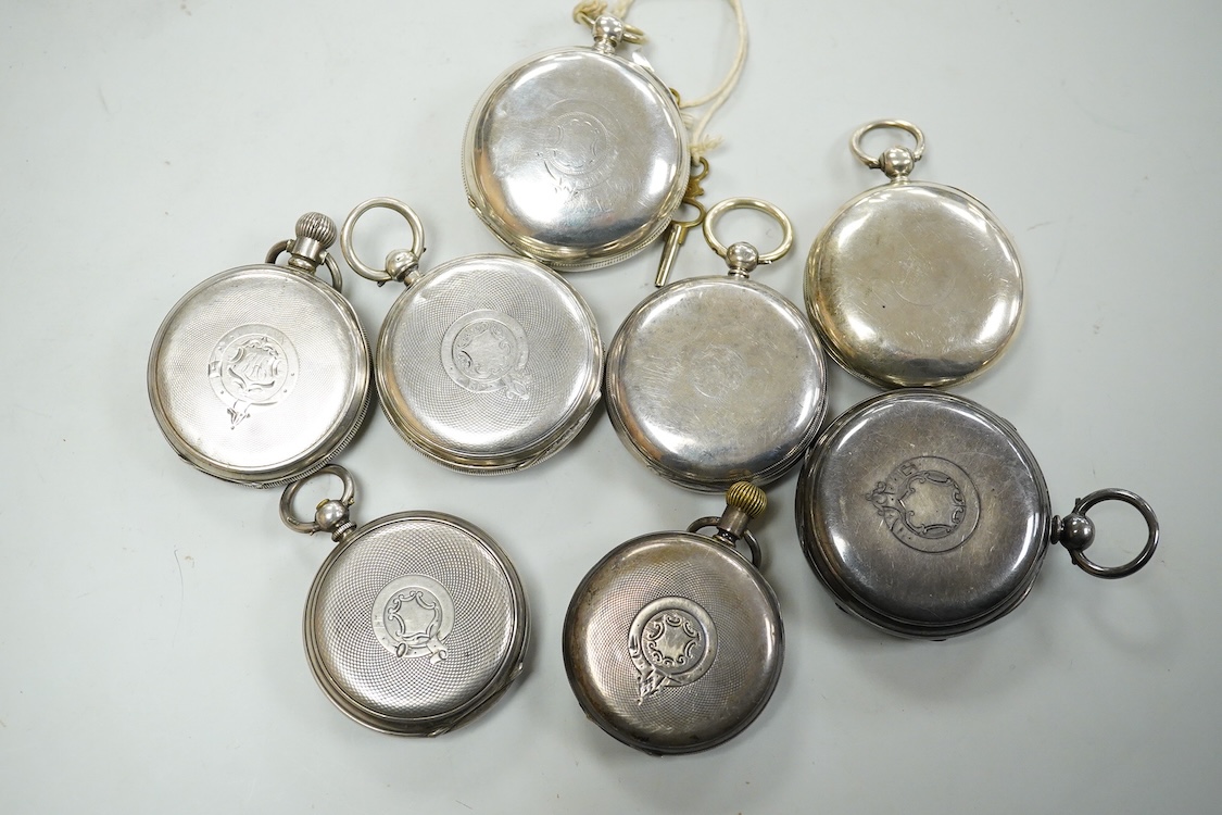 Seven assorted mainly early 20th century silver open faced pocket watches including a chronograph by William Williams of Bury, case diameter 53mm and one other silver pocket watch case(no movement).